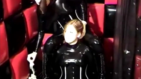 Latex handgag and breathplay