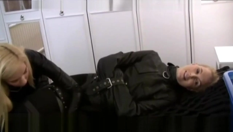 Bondage girl in straitjacket