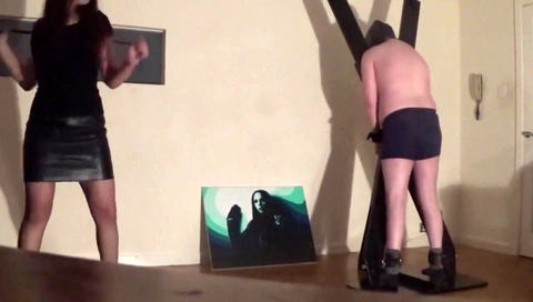 Hot Brunette Mistress whipping tied slave