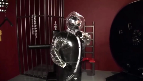 Blonde Girl In Black Latex Catsuit Full Encased In Inflatable Rubber And Full Body Plastic Suit
