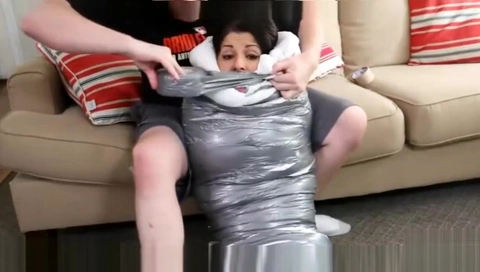 MUMMIFED IN BLANKET
