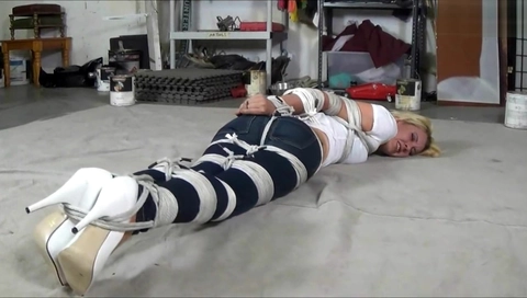 Taped bondage girl