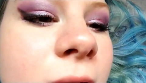 Girl fingering her nose