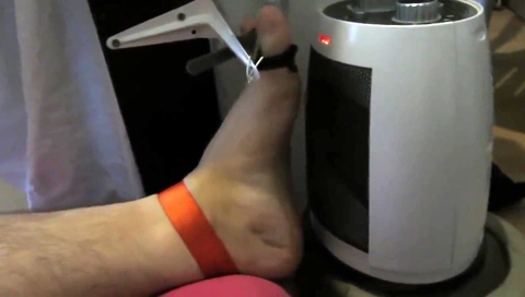 Torture of roasted foot by heating after bastinado