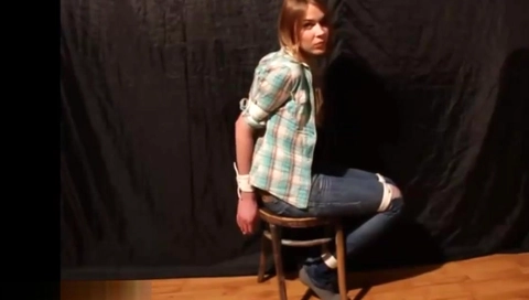 CHAIR TIED IN JEANS