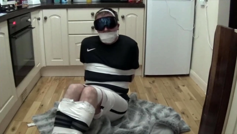 Footballer bound and gagged tight in duct tape 2