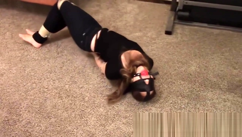Girl tied up and ballgagged